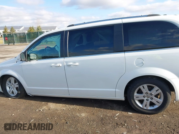 2019 Dodge Grand Caravan SXT with VIN 2C4RDGCG4KR771745, listed as a IAAI auction lot 41859267 with 97,436 mi miles and . Bid and sale history available at DreamBid. Image 14.