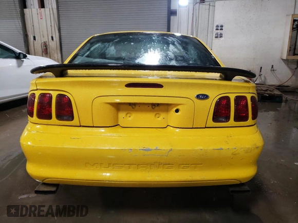 1998 Ford Mustang GT z VIN 1FAFP42X3WF207288, wystawiony jako Copart lot #45158425 z przebiegiem 165 311 mil mil oraz Szkoda całkowita • Salvage title. Historia ofert i sprzedaży dostępna na DreamBid. Obrazek 6.