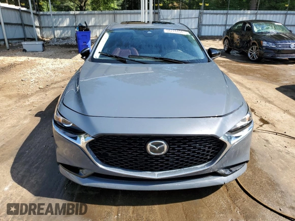 2022 Mazda 3 Carbon Edition z VIN JM1BPACL1N1506356, wystawiony jako Copart lot #58228434 z przebiegiem 96 855 mil mil oraz Szkoda całkowita • Salvage title. Historia ofert i sprzedaży dostępna na DreamBid. Obrazek 5.