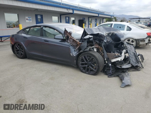 2022 Tesla Model S with VIN 5YJSA1E5XNF474238, listed as a Copart auction lot 54220115 with Not provided miles and Salvage title. Bid and sale history available at DreamBid. Image 4.
