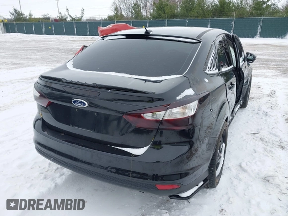 2013 Ford Focus SE z VIN 1FADP3F28DL337355, wystawiony jako IAAI lot #41000947 z przebiegiem 139 456 mil mil oraz . Historia ofert i sprzedaży dostępna na DreamBid. Obrazek 4.