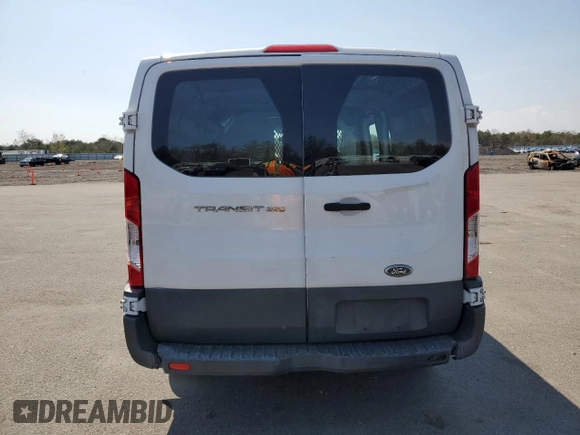 2015 Ford Transit Cargo with VIN 1FTNR1ZM5FKA66614, listed as a Copart auction lot 70069244 with 52,690 mi miles and Salvage Title. Bid and sale history available at DreamBid. Image 6.