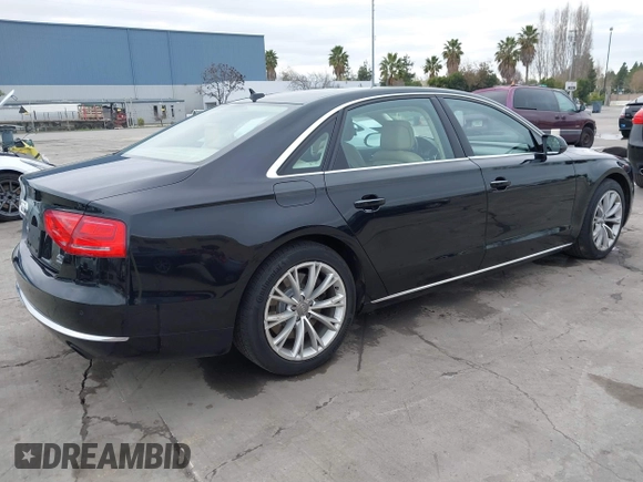 2012 Audi A8 L with VIN WAURVAFD7CN005452, listed as a IAAI auction lot 41529084 with 80,738 mi miles. Bid and sale history available at carsss.com. Image 4.