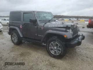 2014 Jeep Wrangler Rubicon with VIN 1C4BJWCG9EL189819, listed as a Copart auction lot 80522204 with 82,083 mi miles and Salvage title. Bid and sale history available at DreamBid. Image 4.