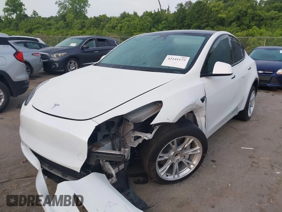 2023 Tesla Model Y Long Range with VIN 7SAYGDEE4PF770307, listed as a IAAI auction lot 42141175 with 34,901 mi miles and . Bid and sale history available at carsss.com. Image 20.