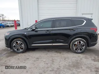 2019 Hyundai Santa Fe Ultimate with VIN 5NMS5CAA8KH019109, listed as a IAAI auction lot 41120391 with 101,829 mi miles and . Bid and sale history available at DreamBid. Image 14.