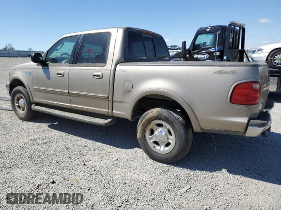 2002 Ford F-150 XLT with VIN 1FTRW08L82KE32539, listed as a Copart auction lot 51017735 with 269,434 mi miles and Salvage Title. Bid and sale history available at carsss.com. Image 2.