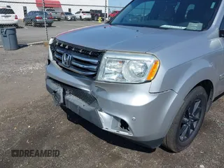 2013 Honda Pilot Touring with VIN 5FNYF3H95DB032438, listed as a IAAI auction lot 41865938 with 298,973 mi miles and . Bid and sale history available at DreamBid. Image 6.