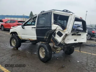 2001 Jeep Cherokee Sport with VIN 1J4FF48S41L611052, listed as a Copart auction lot 59667135 with 270,448 mi miles and Clean title. Bid and sale history available at DreamBid. Image 2.