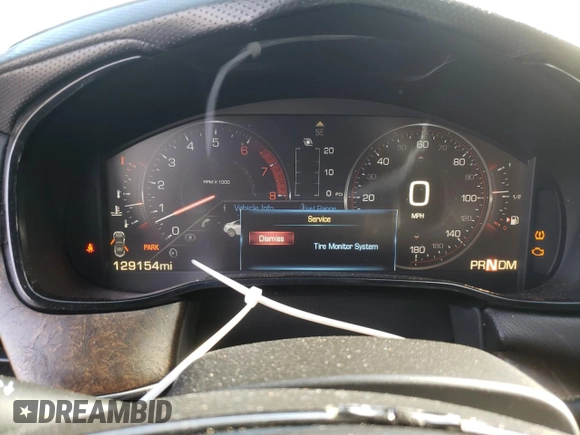 2014 Cadillac CTS Vsport Premium RWD z VIN 1G6AV5S80E0171279, wystawiony jako Copart lot #63759434 z przebiegiem 129 154 mil mil oraz Szkody całkowita. Historia ofert i sprzedaży dostępna na DreamBid. Obrazek 9.