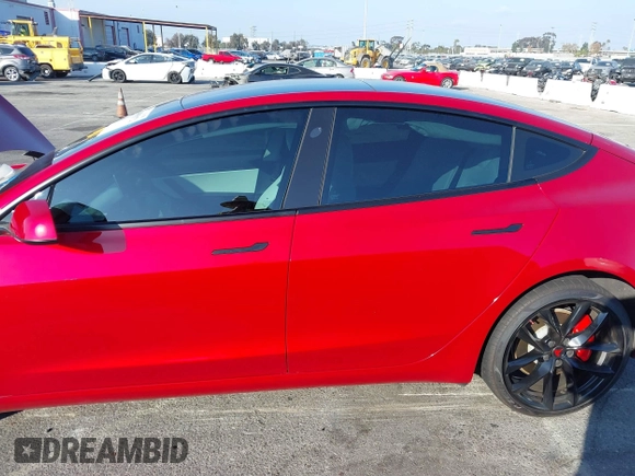 2021 Tesla Model 3 Performance with VIN 5YJ3E1EC9MF926301, listed as a IAAI auction lot 40959721 with 28,094 mi miles and . Bid and sale history available at DreamBid. Image 14.