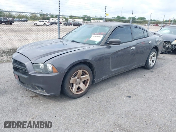 2014 Dodge Charger Police z VIN 2C3CDXAT9EH191184, wystawiony jako IAAI lot #42468882 z przebiegiem 202 790 mil mil oraz . Historia ofert i sprzedaży dostępna na DreamBid. Obrazek 17.