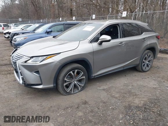 2019 Lexus RX with VIN 2T2BZMCA0KC184967, listed as a IAAI auction lot 41614592 with 35,860 mi miles. Bid and sale history available at carsss.com. Image 2.