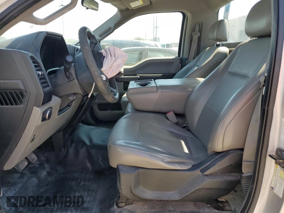 2016 Ford F-150 XL with VIN 1FTMF1C86GKD33700, listed as a Copart auction lot 48743235 with 104,561 mi miles and Salvage title. Bid and sale history available at DreamBid. Image 7.