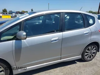 2013 Honda Fit Sport z VIN JHMGE8H56DC009996, wystawiony jako IAAI lot #42349929 z przebiegiem 152 779 mil mil oraz . Historia ofert i sprzedaży dostępna na DreamBid. Obrazek 14.