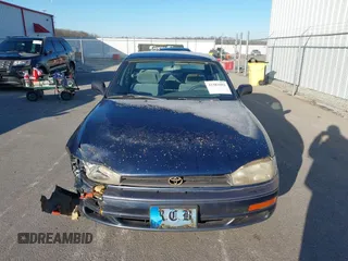 1994 Toyota Camry LE with VIN 4T1SK12EXRU374215, listed as a IAAI auction lot 41581093 with 80,397 mi miles. Bid and sale history available at carsss.com. Image 12.