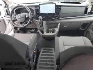 2025 Ford Transit Passenger XL z VIN 1FBAX2YG7SKA63962, wystawiony jako Copart lot #64595845 z przebiegiem 3 011 mil mil oraz Nie do naprawy • Non repairable. Historia ofert i sprzedaży dostępna na DreamBid. Obrazek 8.