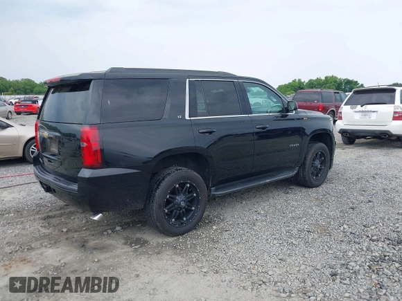 2017 Chevrolet Tahoe LT z VIN 1GNSCBKC1HR326973, wystawiony jako IAAI lot #42212769 z przebiegiem 128 074 mil mil oraz . Historia ofert i sprzedaży dostępna na DreamBid. Obrazek 4.