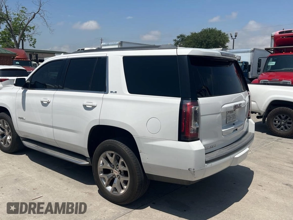 2015 GMC Yukon SLE with VIN 1GKS1AKCXFR513784, listed as a Copart auction lot 54203395 with 219,112 mi miles and Clean Title. Bid and sale history available at carsss.com. Image 3.