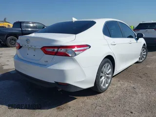 2019 Toyota Camry LE with VIN 4T1B11HK9KU825107, listed as a IAAI auction lot 41971159 with 15,802 mi miles and . Bid and sale history available at DreamBid. Image 4.