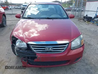 2009 Kia Spectra EX with VIN KNAFE221495665378, listed as a IAAI auction lot 42036945 with 153,254 mi miles. Bid and sale history available at carsss.com. Image 6.