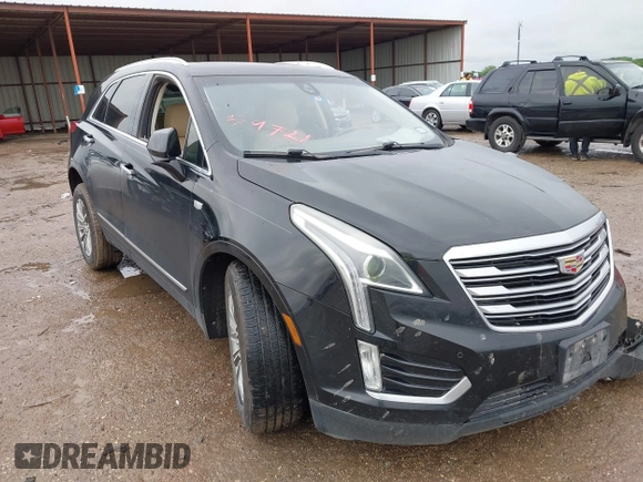2017 Cadillac XT5 Luxury FWD with VIN 1GYKNBRS6HZ159892, listed as a IAAI auction lot 42159721 with 163,856 mi miles and . Bid and sale history available at DreamBid. Image 1.
