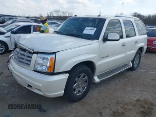 2005 Cadillac Escalade z VIN 1GYEC63T55R115387, wystawiony jako IAAI lot #41791855 z przebiegiem 165 246 mil mil oraz . Historia ofert i sprzedaży dostępna na DreamBid. Obrazek 18.