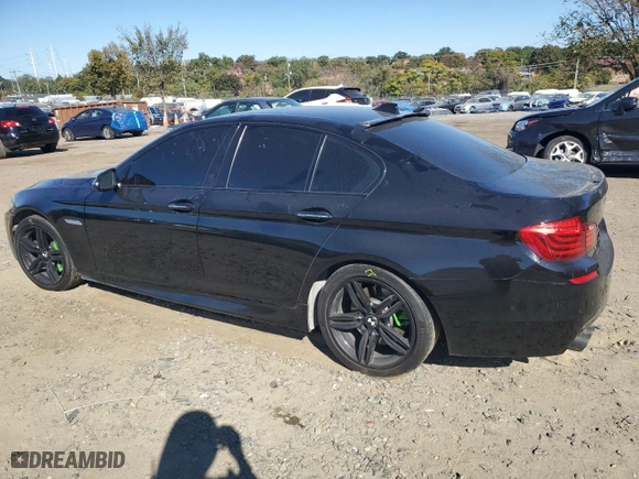 2016 BMW 5 Series 550i xDrive with VIN WBAKP9C58GG587806, listed as a Copart auction lot 76317094 with 127,918 mi miles and Salvage Title. Bid and sale history available at carsss.com. Image 2.