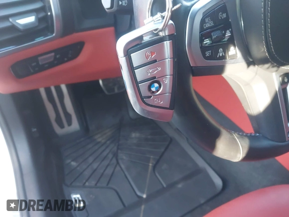 2023 BMW 8 Series M850i z VIN WBAGV8C0XPCL58173, wystawiony jako IAAI lot #41693747 z przebiegiem 24 954 mil mil oraz . Historia ofert i sprzedaży dostępna na DreamBid. Obrazek 11.