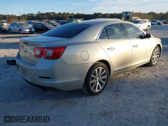 2014 Chevrolet Malibu LTZ with VIN 1G11H5SL9EF299826, listed as a IAAI auction lot 40955208 with 213,203 mi miles and . Bid and sale history available at DreamBid. Image 4.