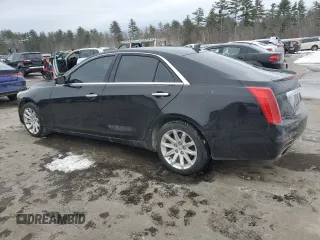 2014 Cadillac CTS AWD with VIN 1G6AW5SX6E0142793, listed as a Copart auction lot 43312545 with 101,124 mi miles and Salvage title. Bid and sale history available at DreamBid. Image 2.
