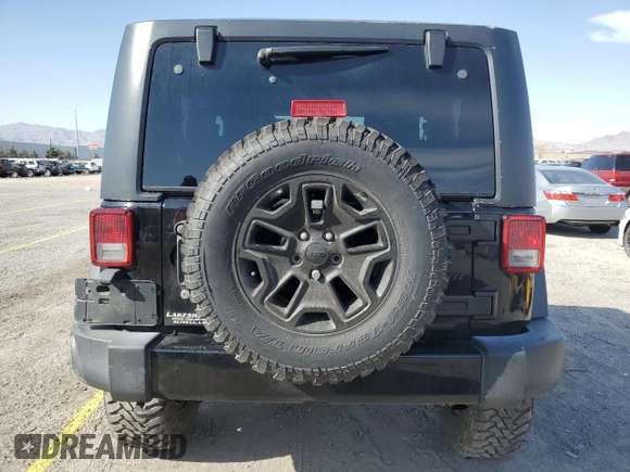 2017 Jeep Wrangler Sport with VIN 1C4AJWAGXHL715362, listed as a Copart auction lot 51262305 with 62,297 mi miles and Salvage Title. Bid and sale history available at DreamBid. Image 6.
