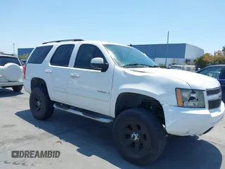 2007 Chevrolet Tahoe LT z VIN 1GNFK130X7R256830, wystawiony jako IAAI lot #42456132 z przebiegiem 107 068 mil mil oraz . Historia ofert i sprzedaży dostępna na DreamBid. Obrazek 1.