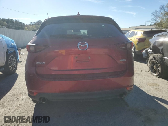 2018 Mazda CX-5 Grand Touring with VIN JM3KFADM1J1454982, listed as a Copart auction lot 49162495 with 109,559 mi miles and Salvage Title. Bid and sale history available at DreamBid. Image 6.