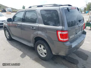 2010 Ford Escape XLT with VIN 1FMCU0D73AKC67711, listed as a IAAI auction lot 41891915 with 254,378 mi miles. Bid and sale history available at carsss.com. Image 3.