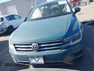 2021 Volkswagen Tiguan SE with VIN 3VV2B7AXXMM089913, listed as a IAAI auction lot 41402158 with 68,158 mi miles and . Bid and sale history available at DreamBid. Image 12.