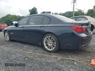 2014 BMW 7 Series 740Li xDrive with VIN WBAYF4C55ED281791, listed as a Copart auction lot 64210005 with 154,365 mi miles and Clean title. Bid and sale history available at DreamBid. Image 2.