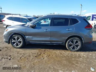 2018 Nissan Rogue S with VIN JN8AT2MV9JW309546, listed as a IAAI auction lot 41600506 with 90,703 mi miles. Bid and sale history available at carsss.com. Image 14.