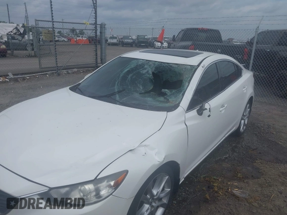 2016 Mazda Mazda6 i Touring with VIN JM1GJ1V56G1448334, listed as a IAAI auction lot 42075222 with 52,883 mi miles. Bid and sale history available at carsss.com. Image 6.