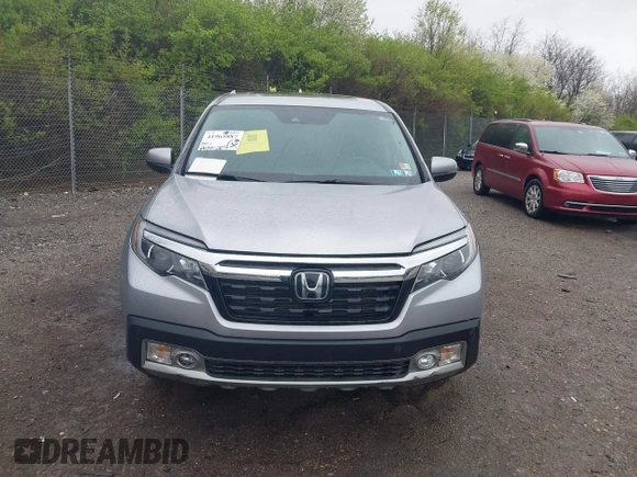 2020 Honda Ridgeline RTL-E with VIN 5FPYK3F73LB004365, listed as a IAAI auction lot 41965887 with 80,981 mi miles and . Bid and sale history available at DreamBid. Image 12.