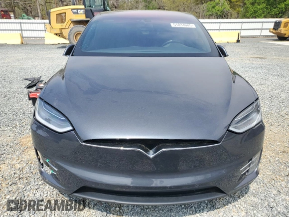 2016 Tesla Model X 70D z VIN 5YJXCBE23GF005295, wystawiony jako Copart lot #51034005 z przebiegiem 130 325 mil mil oraz Szkody całkowita. Historia ofert i sprzedaży dostępna na DreamBid. Obrazek 5.