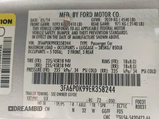 2014 Ford Fusion Titanium with VIN 3FA6P0K99ER358244, listed as a IAAI auction lot 42085703 with 194,626 mi miles. Bid and sale history available at carsss.com. Image 9.