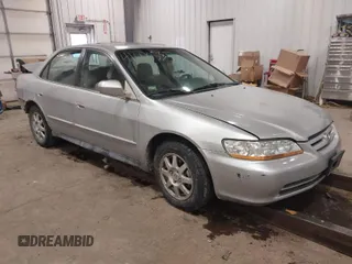 2002 Honda Accord SE z VIN JHMCG56732C035545, wystawiony jako IAAI lot #41606535 z przebiegiem 247 975 mil mil oraz . Historia ofert i sprzedaży dostępna na DreamBid. Obrazek 1.