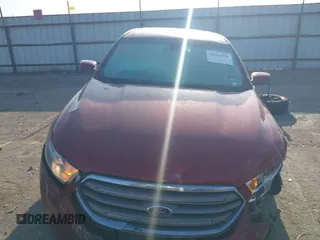2014 Ford Taurus SEL with VIN 1FAHP2E80EG159131, listed as a IAAI auction lot 42004296 with 140,213 mi miles and . Bid and sale history available at DreamBid. Image 13.