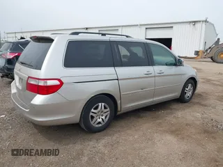 2007 Honda Odyssey EX-L z VIN 5FNRL38677B451060, wystawiony jako IAAI lot #42161554 z przebiegiem 190 147 mil mil oraz . Historia ofert i sprzedaży dostępna na DreamBid. Obrazek 4.