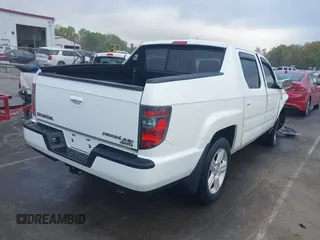 2014 Honda Ridgeline RTL with VIN 5FPYK1F58EB011186, listed as a IAAI auction lot 41903178 with 113,364 mi miles. Bid and sale history available at carsss.com. Image 4.