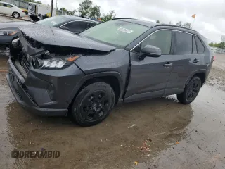 2019 Toyota RAV4 LE with VIN JTMG1RFV0KD008629, listed as a Copart auction lot 59789675 with 104,808 mi miles and Salvage title. Bid and sale history available at DreamBid. Image 1.