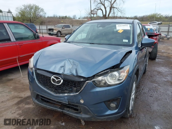 2014 Mazda CX-5 Grand Touring with VIN JM3KE4DYXE0403192, listed as a IAAI auction lot 41828016 with 156,270 mi miles and . Bid and sale history available at carsss.com. Image 6.