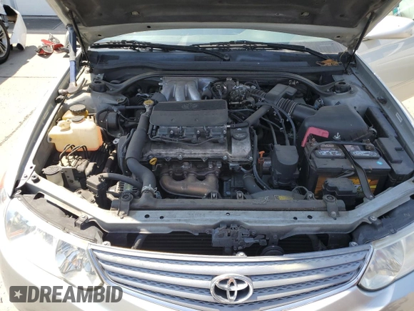 2002 Toyota Solara SE z VIN 2T1CF28P62C575561, wystawiony jako Copart lot #59748025 z przebiegiem 108 748 mil mil oraz Szkoda całkowita • Salvage title. Historia ofert i sprzedaży dostępna na DreamBid. Obrazek 11.