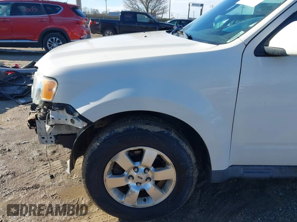 2011 Ford Escape Limited with VIN 1FMCU9EG5BKC09796, listed as a IAAI auction lot 41792944 with 134,117 mi miles. Bid and sale history available at carsss.com. Image 18.